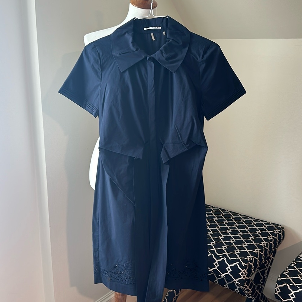 Black Elie Tahari dress. Comes with belt.